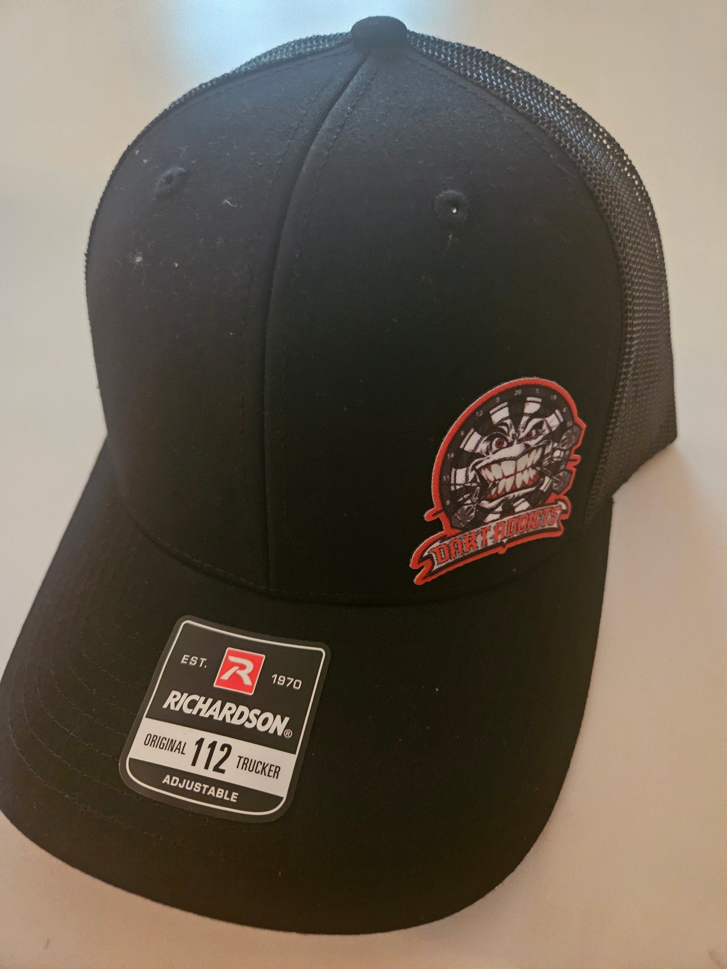 TRUCKER HAT WITH NEW LOGO